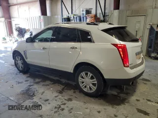 2015 Cadillac SRX Luxury Collection z VIN 3GYFNBE38FS618933, wystawiony jako Copart lot #45332835 z przebiegiem 64 819 mil mil oraz Szkody całkowita. Historia ofert i sprzedaży dostępna na DreamBid. Obrazek 2.