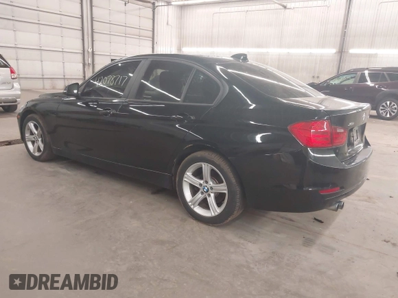2014 BMW 3 Series 328i xDrive with VIN WBA3B3C5XEJ980450, listed as a IAAI auction lot 42078717 with 108,763 mi miles. Bid and sale history available at carsss.com. Image 3.