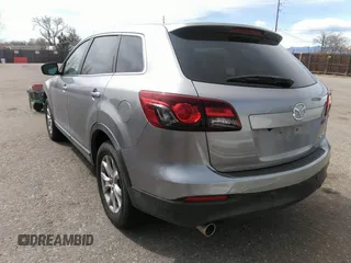 2014 Mazda CX-9 Touring z VIN JM3TB2CV5E0437629, wystawiony jako IAAI lot #41849662 z przebiegiem 105 311 mil mil oraz . Historia ofert i sprzedaży dostępna na DreamBid. Obrazek 3.