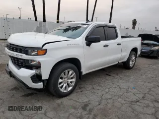 2021 Chevrolet Silverado 1500 Custom with VIN 1GCRWBEH9MZ122437, listed as a Copart auction lot 86158574 with 31,865 mi miles and Salvage Title. Bid and sale history available at DreamBid. Image 1.