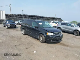 2008 Chrysler Town & Country Touring z VIN 2A8HR54P48R765302, wystawiony jako IAAI lot #42487816 z przebiegiem 128 761 mil mil oraz . Historia ofert i sprzedaży dostępna na DreamBid. Obrazek 1.