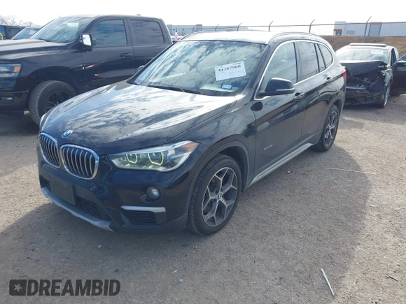 2016 BMW X1 xDrive28i with VIN WBXHT3Z3XG4A48557, listed as a IAAI auction lot 41387960 with 84,821 mi miles. Bid and sale history available at carsss.com. Image 17.