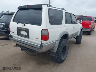 1997 Toyota 4Runner Limited with VIN JT3GN87R3V0027711, listed as a IAAI auction lot 41940566 with 340,422 mi miles. Bid and sale history available at carsss.com. Image 4.