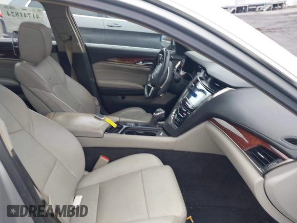 2014 Cadillac CTS Luxury AWD z VIN 1G6AX5SX3E0194895, wystawiony jako IAAI lot #41741824 z przebiegiem 197 042 mil mil oraz . Historia ofert i sprzedaży dostępna na DreamBid. Obrazek 5.