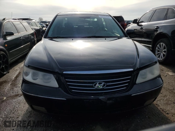 2007 Hyundai Azera SE z VIN KMHFC46F17A154947, wystawiony jako Copart lot #49224835 z przebiegiem 211 940 mil mil oraz Szkoda całkowita • Salvage title. Historia ofert i sprzedaży dostępna na DreamBid. Obrazek 5.