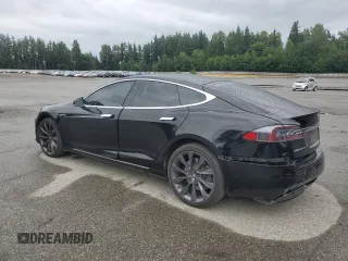 2017 Tesla Model S 100D с VIN 5YJSA1E21HF188840, выставлен на аукционе Copart как лот 62683685 с пробегом 90 101 миль миль и Списание • Salvage title. История ставок и продаж доступна на DreamBid. Изображение 2.