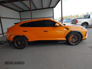 2023 Lamborghini Urus Performante z VIN ZPBUC3ZL6PLA25073, wystawiony jako IAAI lot #41450564 z przebiegiem 13 945 mil mil oraz . Historia ofert i sprzedaży dostępna na DreamBid. Obrazek 14.