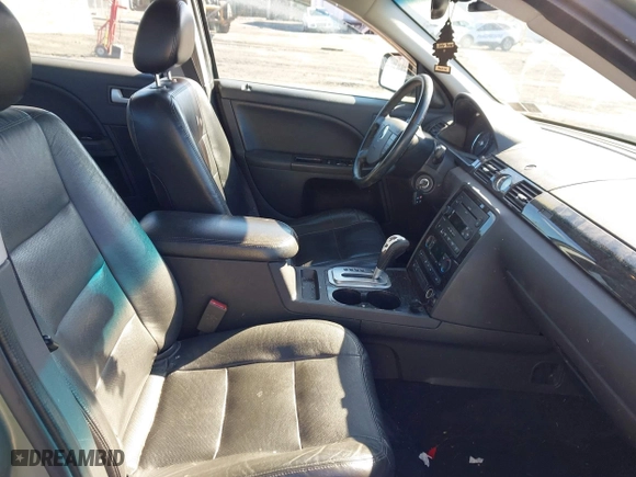 2005 Mercury Montego Premier with VIN 1MEFM42165G618285, listed as a IAAI auction lot 41595913 with 127,811 mi miles. Bid and sale history available at carsss.com. Image 5.