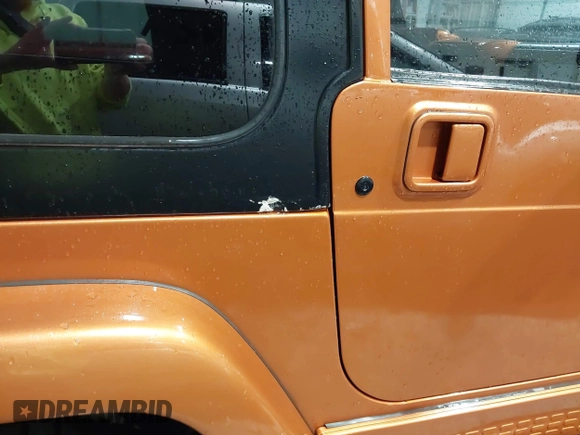 1998 Jeep Wrangler Sahara z VIN 1J4FY49S1WP802940, wystawiony jako IAAI lot #41433820 z przebiegiem 122 180 mil mil oraz . Historia ofert i sprzedaży dostępna na DreamBid. Obrazek 6.
