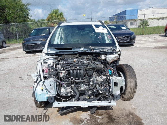 2022 Toyota Corolla Cross LE with VIN 7MUBAAAG9NV012455, listed as a IAAI auction lot 42671891 with Not provided miles and . Bid and sale history available at DreamBid. Image 12.