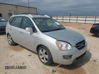 2007 Kia Rondo LX with VIN KNAFG526077069189, listed as a IAAI auction lot 42090474 with 96,722 mi miles. Bid and sale history available at carsss.com. Image 1.