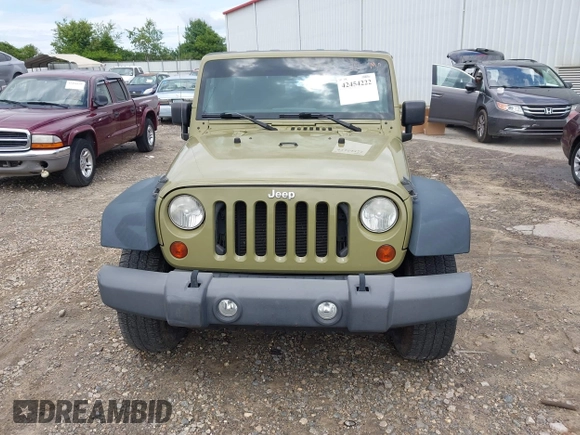 2013 Jeep Wrangler Sport z VIN 1C4AJWAG8DL535534, wystawiony jako IAAI lot #42454222 z przebiegiem 120 355 mil mil oraz . Historia ofert i sprzedaży dostępna na DreamBid. Obrazek 12.