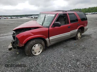 2001 GMC Jimmy SLE z VIN 1GKCS13W312202533, wystawiony jako Copart lot #54607475 z przebiegiem 165 052 mil mil oraz Szkoda całkowita • Salvage title. Historia ofert i sprzedaży dostępna na DreamBid. Obrazek 1.