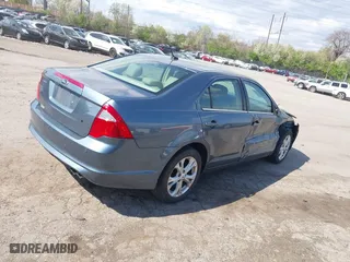 2012 Ford Fusion SE with VIN 3FAHP0HAXCR228318, listed as a IAAI auction lot 42048711 with 76,700 mi miles. Bid and sale history available at carsss.com. Image 4.