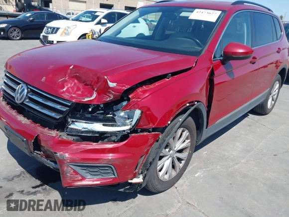 2018 Volkswagen Tiguan SEL z VIN 3VV3B7AX1JM214734, wystawiony jako IAAI lot #42473627 z przebiegiem 79 152 mil mil oraz . Historia ofert i sprzedaży dostępna na DreamBid. Obrazek 6.