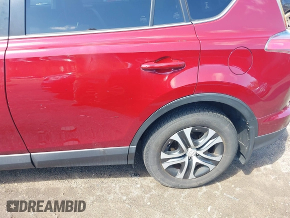 2018 Toyota RAV4 LE with VIN JTMBFREV2JD228186, listed as a IAAI auction lot 42076730 with 93,899 mi miles. Bid and sale history available at carsss.com. Image 19.