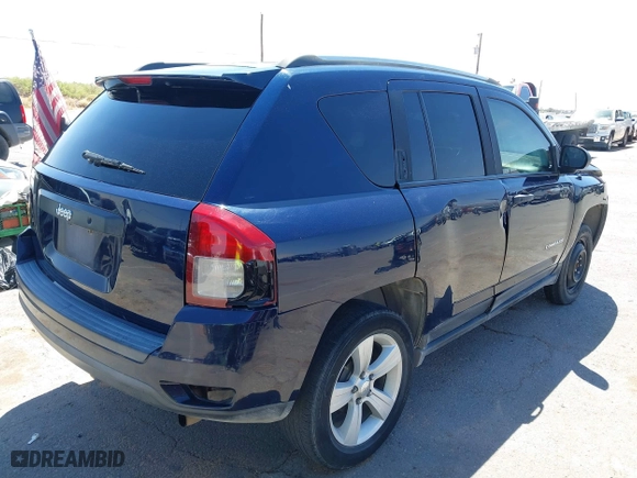2014 Jeep Compass Sport with VIN 1C4NJCBB2ED737297, listed as a IAAI auction lot 42056598 with 185,155 mi miles. Bid and sale history available at carsss.com. Image 4.