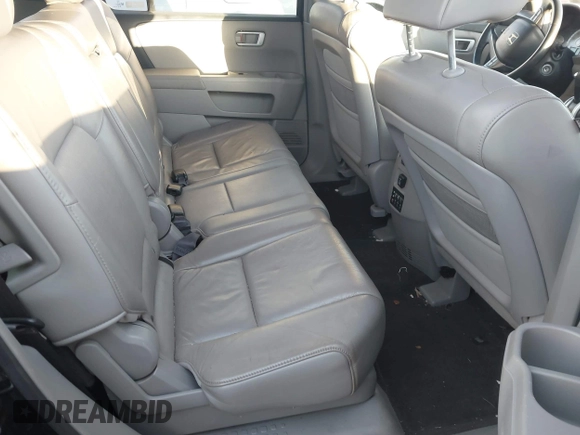 2009 Honda Pilot EX-L with VIN 5FNYF48659B012032, listed as a IAAI auction lot 41801232 with 205,636 mi miles and . Bid and sale history available at carsss.com. Image 8.