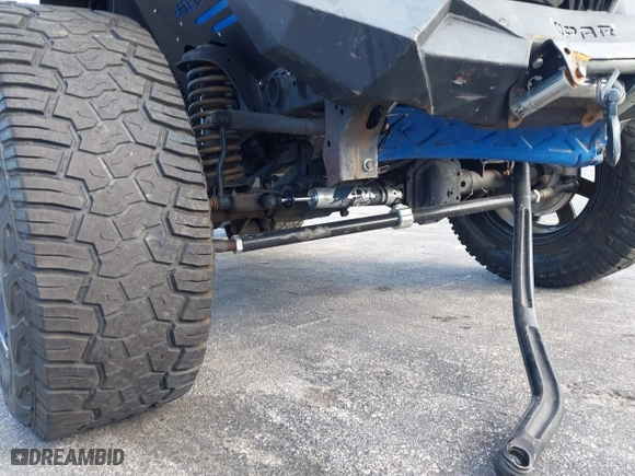 2018 Jeep Wrangler Unlimited Sport S with VIN 1C4HJXDG2JW228483, listed as a IAAI auction lot 41710364 with 56,970 mi miles. Bid and sale history available at carsss.com. Image 17.