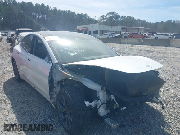 2022 Tesla Model 3 Long Range with VIN 5YJ3E1EB0NF106570, listed as a IAAI auction lot 41832622 with 52,679 mi miles and . Bid and sale history available at DreamBid. Image 13.