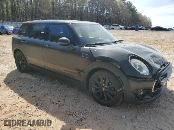 2016 MINI Clubman z VIN WMWLN5C50G2E29737, wystawiony jako Copart lot #50459135 z przebiegiem 129 940 mil mil oraz Szkody całkowita. Historia ofert i sprzedaży dostępna na DreamBid. Obrazek 4.