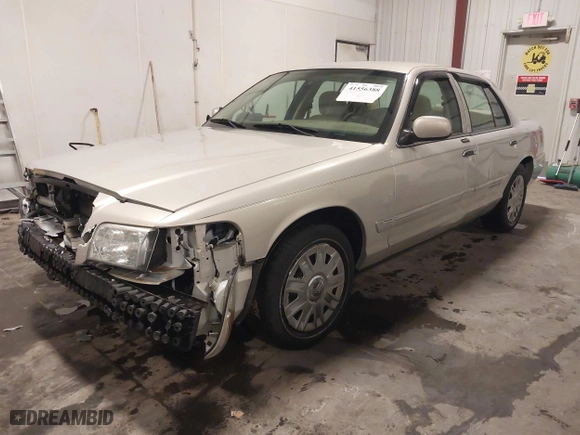 2006 Mercury Grand Marquis GS with VIN 2MEFM74V26X636702, listed as a IAAI auction lot 41556388 with 82,966 mi miles. Bid and sale history available at carsss.com. Image 19.