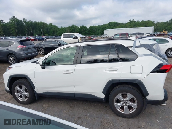 2019 Toyota RAV4 XLE with VIN JTMP1RFV6KD515454, listed as a IAAI auction lot 42618019 with 85,868 mi miles and . Bid and sale history available at DreamBid. Image 14.