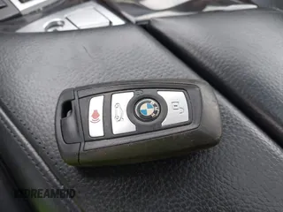 2014 BMW 5 Series 528i with VIN WBA5A5C5XED502261, listed as a IAAI auction lot 41418334 with 139,983 mi miles. Bid and sale history available at carsss.com. Image 11.