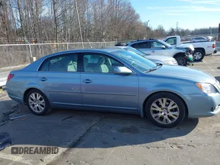2009 Toyota Avalon XL with VIN 4T1BK36B19U350297, listed as a IAAI auction lot 41589714 with 141,003 mi miles. Bid and sale history available at carsss.com. Image 13.