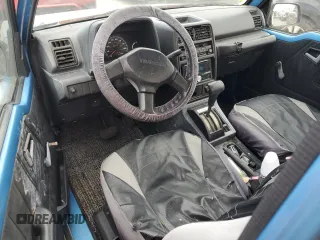 1994 Geo Tracker z VIN 2CNBE18U1R6918878, wystawiony jako Copart lot #75894834 z przebiegiem Nie podano mil oraz Nie do naprawy. Historia ofert i sprzedaży dostępna na DreamBid. Obrazek 8.