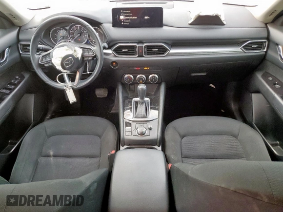 2021 Mazda CX-5 Sport with VIN JM3KFABM7M0325089, listed as a Copart auction lot 50479415 with 137,705 mi miles and Salvage Title. Bid and sale history available at carsss.com. Image 8.