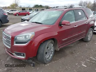 2016 GMC Acadia Denali with VIN 1GKKRTKD6GJ294318, listed as a IAAI auction lot 40770387 with 66,675 mi miles. Bid and sale history available at carsss.com. Image 2.