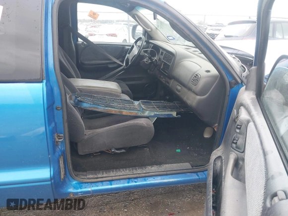 1998 Dodge Dakota SLT z VIN 1B7GG22YXWS683170, wystawiony jako IAAI lot #41903787 z przebiegiem Nie podano mil oraz . Historia ofert i sprzedaży dostępna na DreamBid. Obrazek 5.