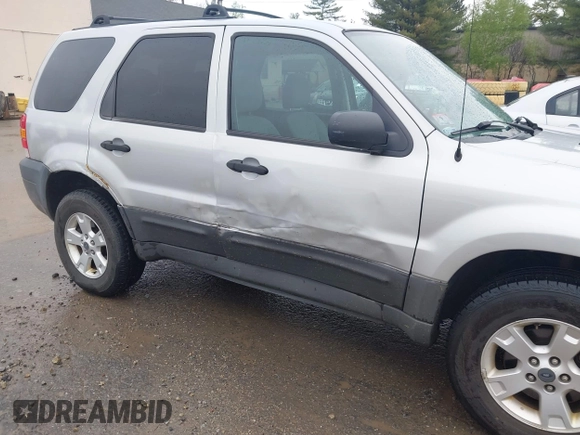 2005 Ford Escape XLT with VIN 1FMCU93115KC10947, listed as a IAAI auction lot 42215066 with 128,475 mi miles and . Bid and sale history available at DreamBid. Image 6.