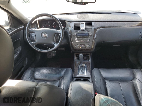 2009 Cadillac DTS 1SC z VIN 1G6KD57Y39U129722, wystawiony jako Copart lot #77071164 z przebiegiem 133 769 mil mil oraz Czysty tytuł • Clean title. Historia ofert i sprzedaży dostępna na DreamBid. Obrazek 8.
