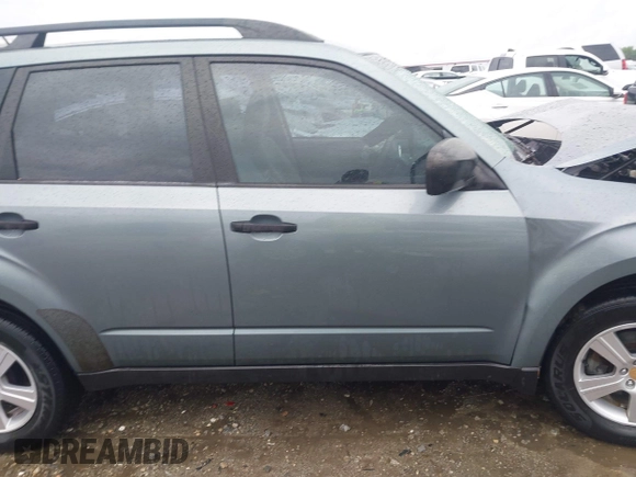 2012 Subaru Forester X with VIN JF2SHBBC4CH442923, listed as a IAAI auction lot 41974351 with 115,776 mi miles and . Bid and sale history available at DreamBid. Image 13.