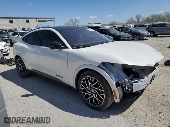 2022 Ford Mustang Mach-E GT with VIN 3FMTK4SX7NMA38575, listed as a Copart auction lot 52729185 with 28,088 mi miles and Salvage title. Bid and sale history available at DreamBid. Image 4.