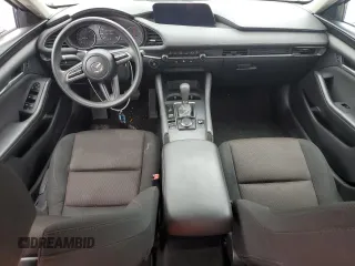 2020 Mazda 3 z VIN 3MZBPABLXLM138984, wystawiony jako Copart lot #59955215 z przebiegiem 53 125 mil mil oraz Nie do naprawy • Non repairable. Historia ofert i sprzedaży dostępna na DreamBid. Obrazek 8.