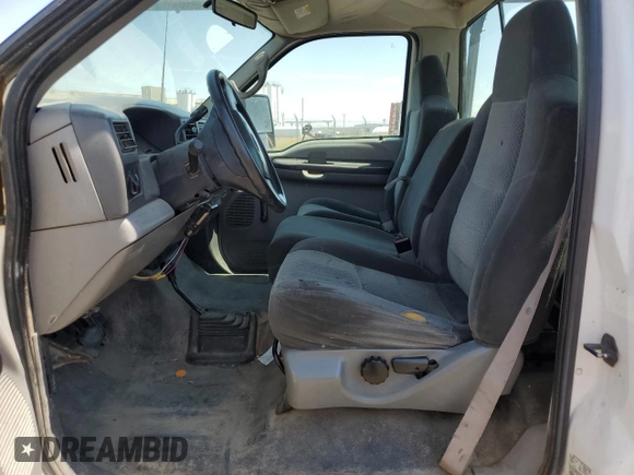 1999 Ford F-250 XL with VIN 1FTNF21L2XEE17853, listed as a Copart auction lot 58869285 with 140,220 mi miles and Clean title. Bid and sale history available at DreamBid. Image 7.
