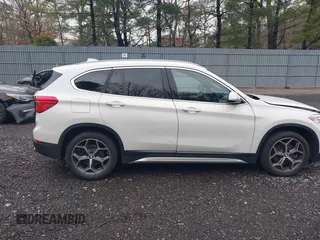 2018 BMW X1 xDrive28i with VIN WBXHT3C36J5L32162, listed as a IAAI auction lot 41802315 with 80,422 mi miles. Bid and sale history available at carsss.com. Image 13.
