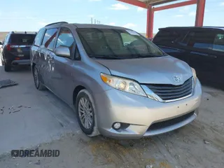 2011 Toyota Sienna XLE AAS with VIN 5TDYK3DC1BS007820, listed as a IAAI auction lot 41935200 with 123,554 mi miles. Bid and sale history available at carsss.com. Image 1.