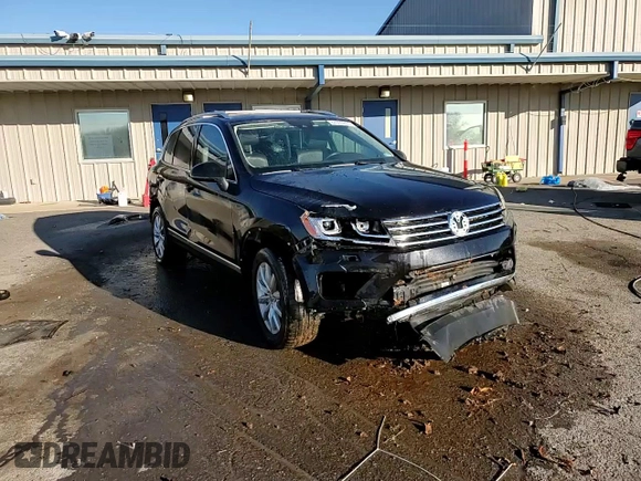 2016 Volkswagen Touareg Sport z VIN WVGEP9BP3GD004865, wystawiony jako Copart lot #87610915 z przebiegiem Nie podano mil oraz Szkoda całkowita • Salvage title. Historia ofert i sprzedaży dostępna na DreamBid. Obrazek 14.