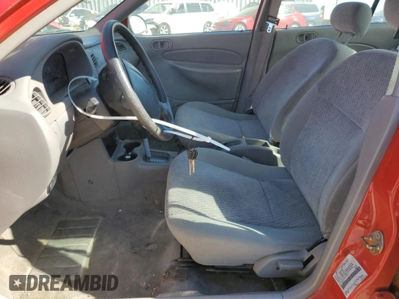1999 Ford Escort LX with VIN 1FAFP10P5XW228873, listed as a Copart auction lot 80167314 with 68,830 mi miles and Clean Title. Bid and sale history available at DreamBid. Image 7.