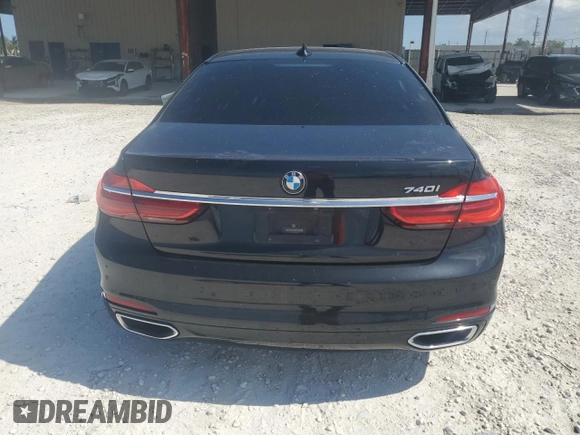 2019 BMW 7 Series 740i с VIN WBA7E2C50KB216552, выставлен на аукционе Copart как лот 56991985 с пробегом 121 140 миль миль и Чистый • Clean title. История ставок и продаж доступна на DreamBid. Изображение 6.