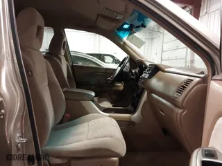 2004 Honda Pilot EX with VIN 2HKYF18464H567384, listed as a IAAI auction lot 41790773 with 142,534 mi miles. Bid and sale history available at carsss.com. Image 5.