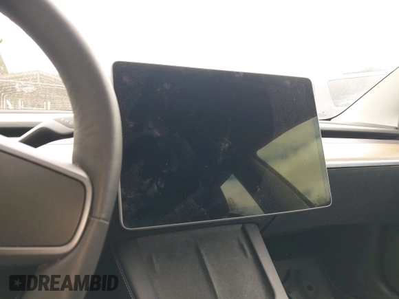 2022 Tesla Model 3 Long Range z VIN 5YJ3E1EB6NF260118, wystawiony jako IAAI lot #42139962 z przebiegiem 52 566 mil mil oraz . Historia ofert i sprzedaży dostępna na DreamBid. Obrazek 19.