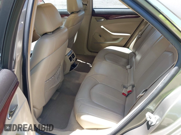 2010 Cadillac CTS Luxury with VIN 1G6DF5EG7A0110647, listed as a IAAI auction lot 42318842 with 243,152 mi miles and . Bid and sale history available at DreamBid. Image 8.