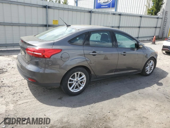 2015 Ford Focus SE with VIN 1FADP3F27FL381074, listed as a Copart auction lot 51945355 with 105,533 mi miles and Salvage Title. Bid and sale history available at carsss.com. Image 3.