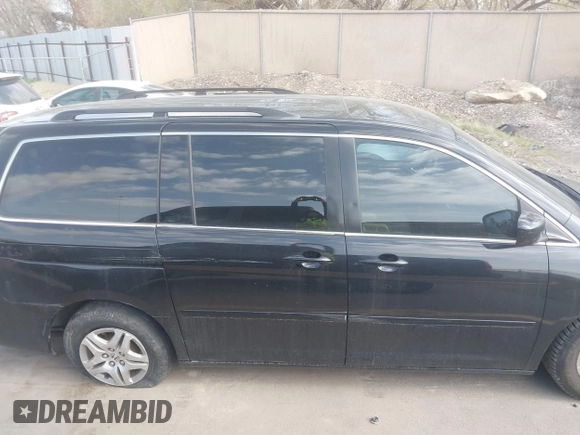 2007 Honda Odyssey EX-L with VIN 5FNRL38627B041332, listed as a IAAI auction lot 41934767 with 234,332 mi miles and . Bid and sale history available at carsss.com. Image 13.