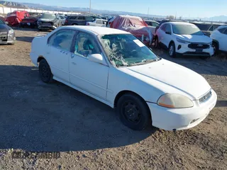 1998 Honda Civic LX with VIN 2HGEJ6675WH553663, listed as a IAAI auction lot 41062394 with 117,514 mi miles. Bid and sale history available at carsss.com. Image 1.